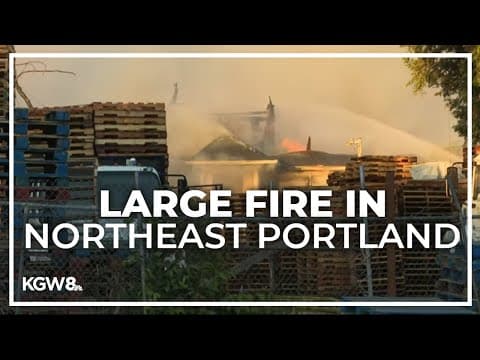 Firefighters battle blaze that started in large pile of pallets, spread to home in NE Portland