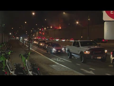 Traffic backs up as federal employees head back to the office