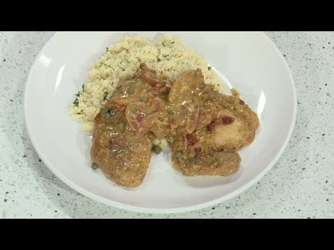 Cooking with Chef Kev: Final touches on Mediterranean chicken over herbed couscous