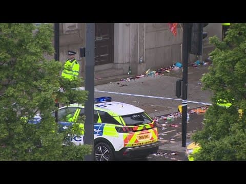 Driver arrested after plowing into parade crowd in England