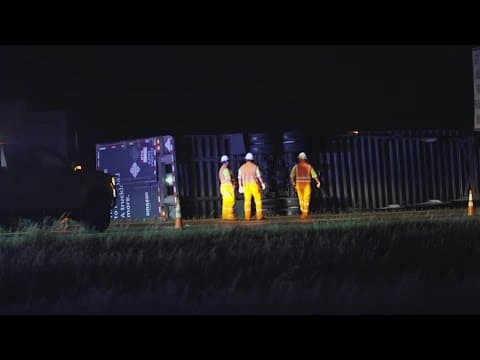 Storms cause a tractor-trailer to flip over near Santo, west of Fort Worth
