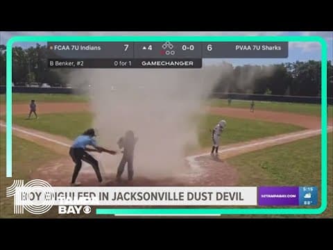 Video: Umpire saves child from dust devil at Florida youth baseball game