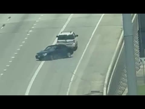 Houston SUV tows car backwards