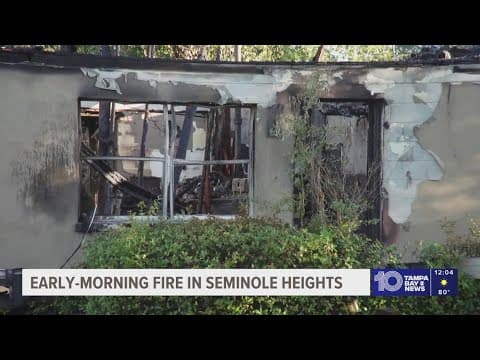 Tampa firefighters battle blaze at Seminole Heights home