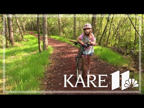 Crosby kids tackle trail at elementary school's new bike path