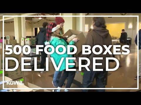 Volunteers work to provide holiday meals to all