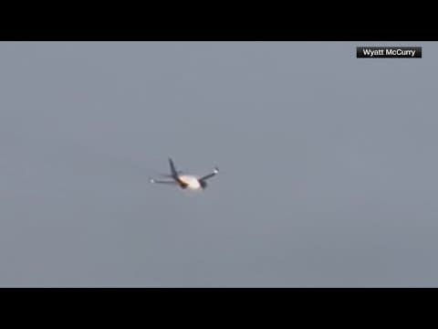 Animal in plane engine causes flames seconds after takeoff from Denver