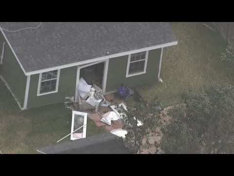 Aerial video after SUV crashes through Spring-area house