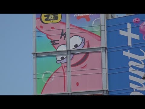Advertisements have wrapped downtown buildings during Comic-Con despite its legality