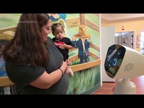 A robot programmed to act like a 7-year-old girl is combatting fear and loneliness in hospitals