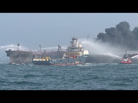 Fire rages after cargo ship hits US tanker