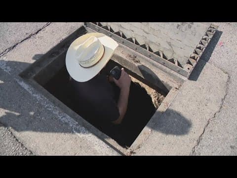 St. Bernard president climbs into storm drain to remove truck tires before storm