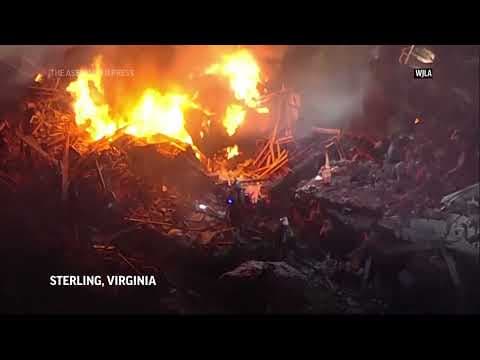 Explosion at a Virginia home kills 1 firefighter, injures 11 others
