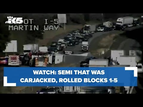 WATCH: Semi that was carjacked, rolled blocks I-5