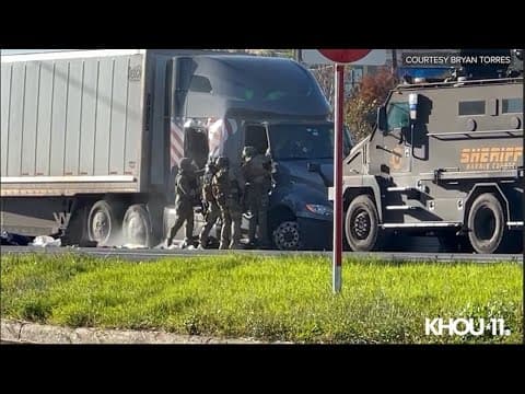 SWAT team pulls driver out of big rig after slow chase chase and standoff on I-10