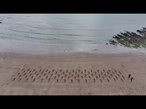 Beach art commemorates D-Day soldiers