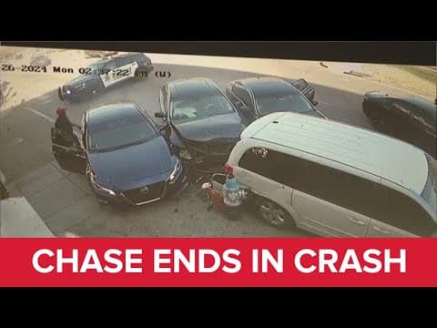 Surveillance video shows the moment a high-speed police chase ended in a crash along the edge of the
