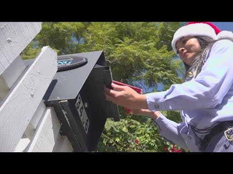 Ride along with the US Postal Service delivering holiday packages