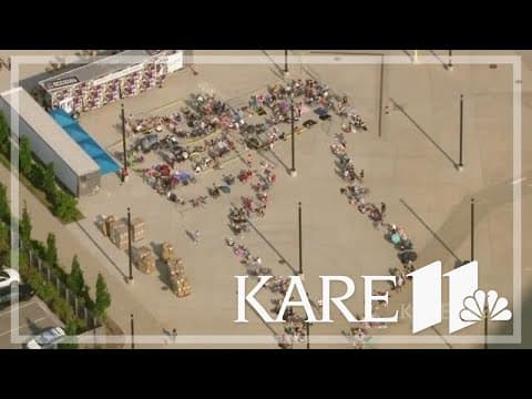 Taylor Swift fans line up for tour merch outside US Bank Stadium