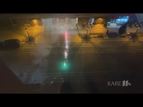 Fireworks shot from the street in Minneapolis Mill District neighborhood