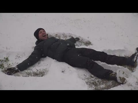 WWL's Mike McDaniel makes a snow angel in Hammond