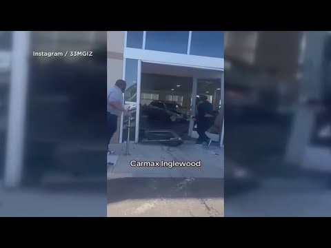 Driver rams into car dealership, 8 injured in California