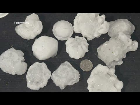 A round of hail sweeps over several North Texas neighborhoods Sunday evening