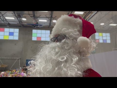 Latino Santa spreads holiday cheer