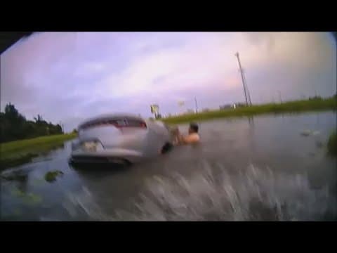 Texas officer honored for saving woman who drove into a lake after having a seizure