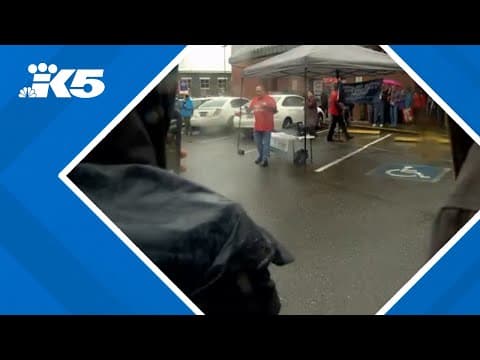 USPS workers hold rallies across Washington state as potential job cuts loom