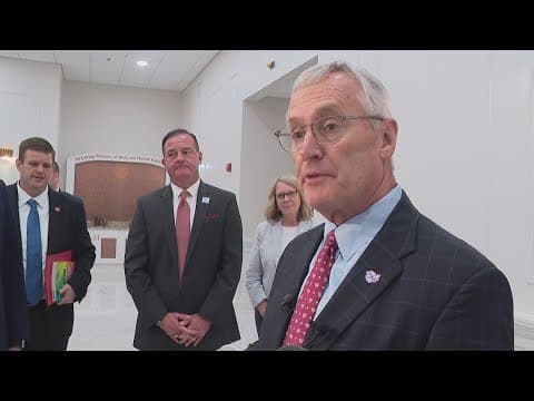 Lt. Gov. Jim Tressel visits LifeTown, volunteers with current and former Buckeyes