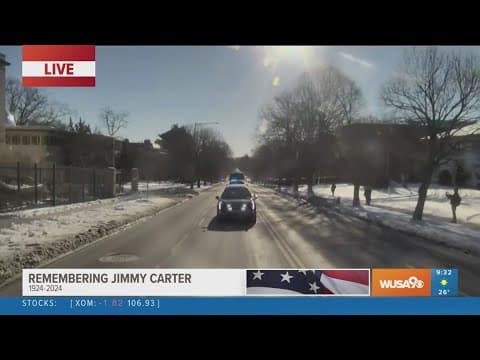 Jimmy Carter's motorcade heads to Washington National Cathedral for state funeral