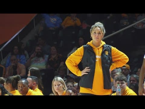 Legendary Lady Vol Joan Cronan congratulates Kim Caldwell on recent birth