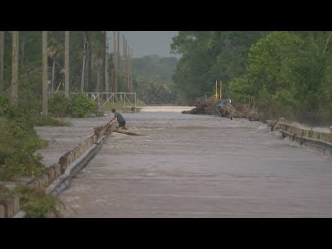 Shern-Min Chow was in Channelview, where water continues to flow over the Wallisville Road