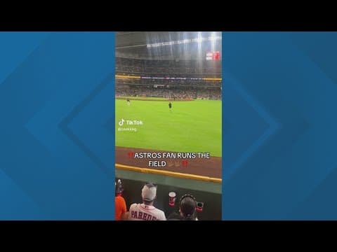 Fan rushes field during Astros game before being tackled by security