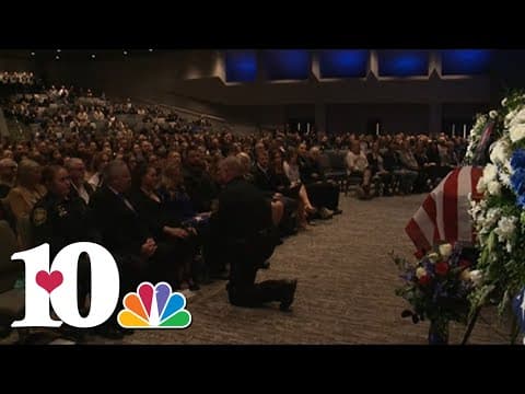 Blount County deputies present folded American flags to those who loved Deputy Greg McCowan