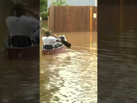 Man Canoes Down Street in Georgia After Hurricane Helene
