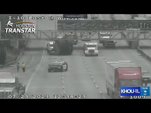 Big spool blocking traffic on I-10 near Wayside
