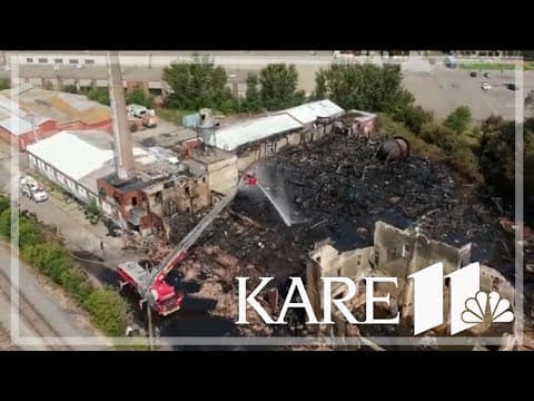 Massive fire tears through 4 buildings