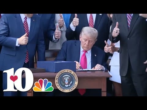 Trump signs his tax and spending cut bill at the White House July 4 picnic