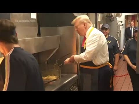 Trump hits out at Harris as he works fry station at Pennsylvania McDonald's