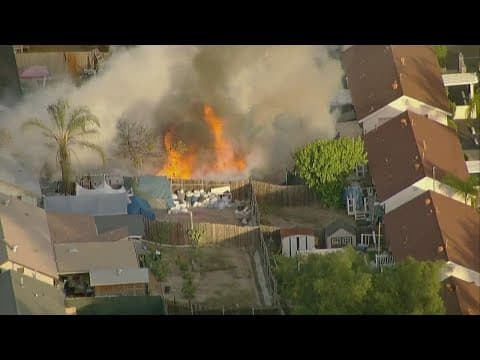 Watch: Crews battle fire at a home in National City