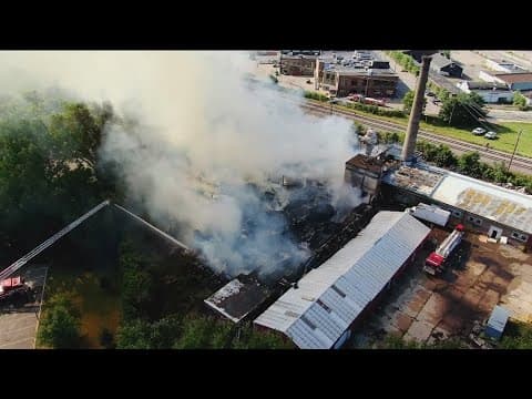 Multi-alarm fire burns commercial buildings in Minneapolis