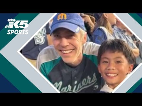 Mariners fan's act of kindness gives boy priceless souvenir during historic night