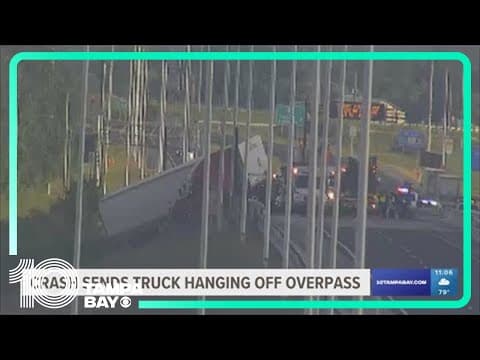 Semi-truck hangs off overpass after crash on Polk Parkway East