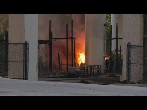 Massive fire closes Ohio River bridge near Cincinnati and damages its steel structure