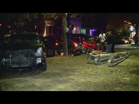 Two cars crash into each other, knock out traffic lights