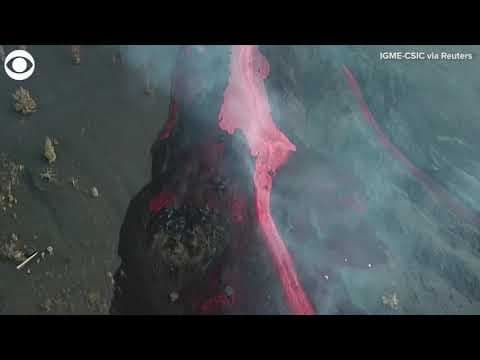 Massive blocks of lava flow down volcano on island of La Palma in Spain
