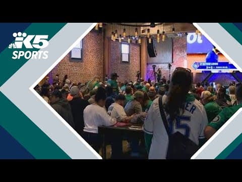 Mariners fans celebrate ALCS Game 2 win during watch party at Victory Hall