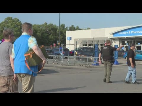 A man accused of stabbing 11 people at a Walmart is in Michigan authorities' custody